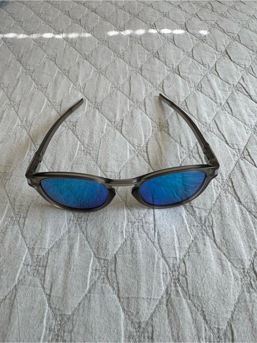 Oakley Round Sunglasses Gray Frame with Teal Blue Mirror Lenses